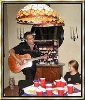 Click this image to see photos of Craig Deanto singing the special song he wrote for abducted child Angeline Hoercher to her after her recovery!
